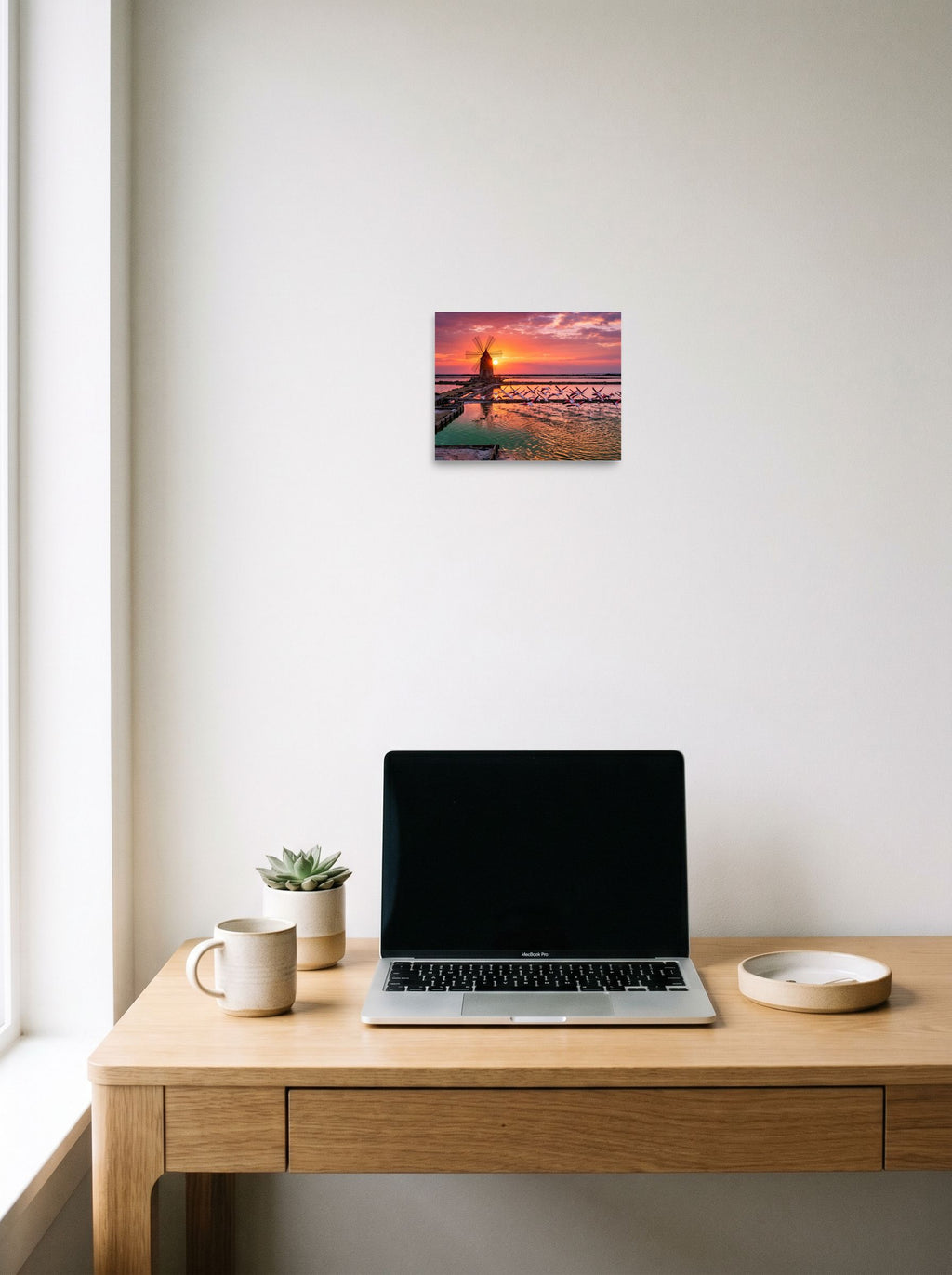 The unframed paper print 'Flamingos at Dusk' styled above a home-office workspace, shown at 10x8 inch.