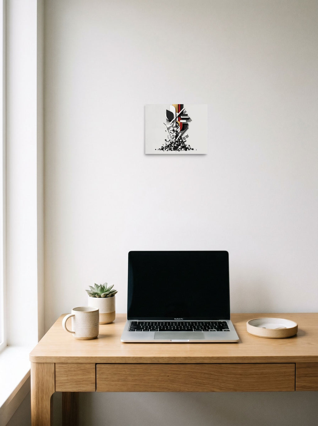A 10x8 inch unframed paper version of 'Cascading Geometric Construct', Constructivism wall art, hanging above a worktable with a laptop.