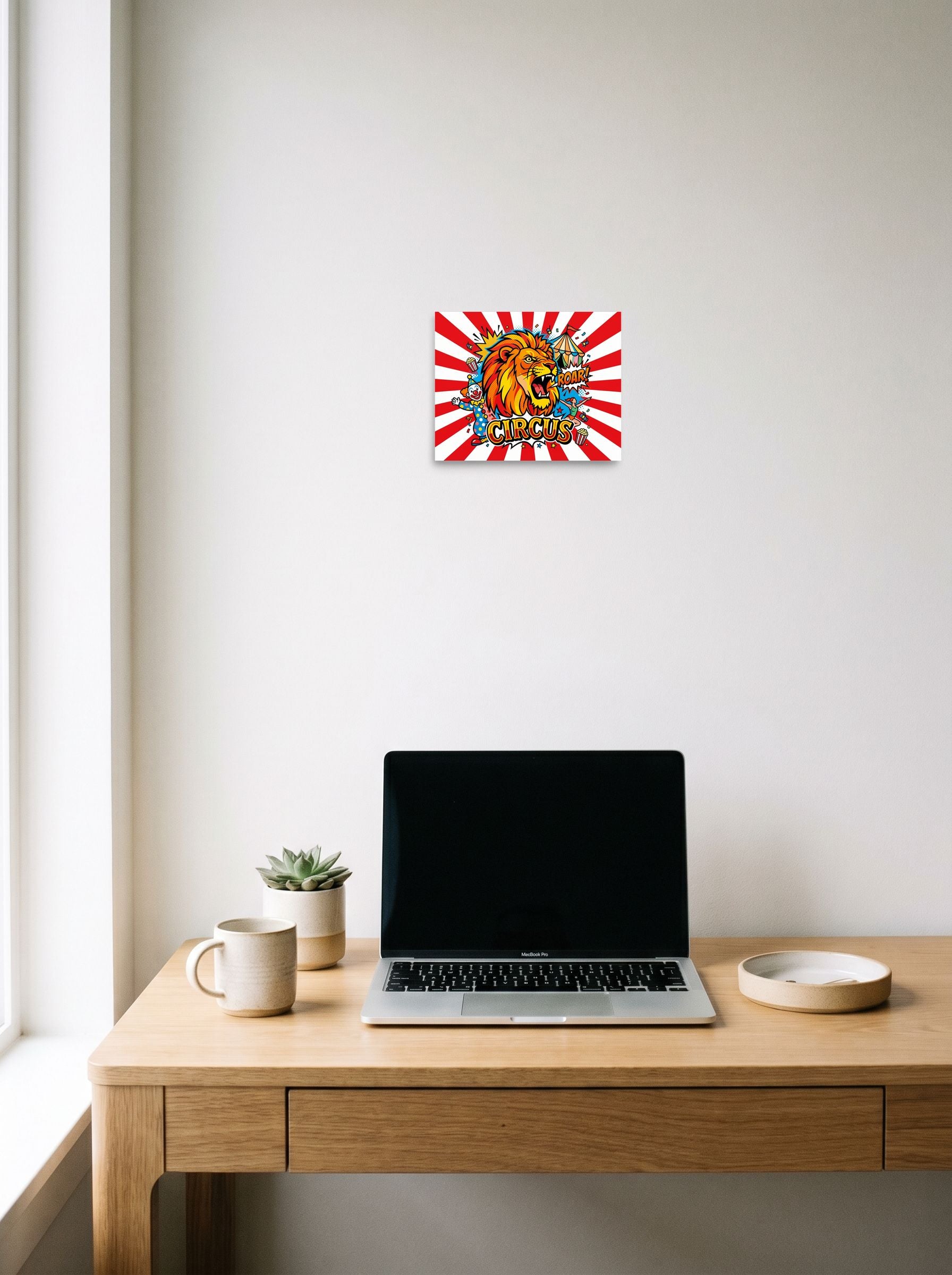 A 10x8 inch unframed paper Pop art print of 'Roar of the Circus' hanging above a worktable with a laptop.