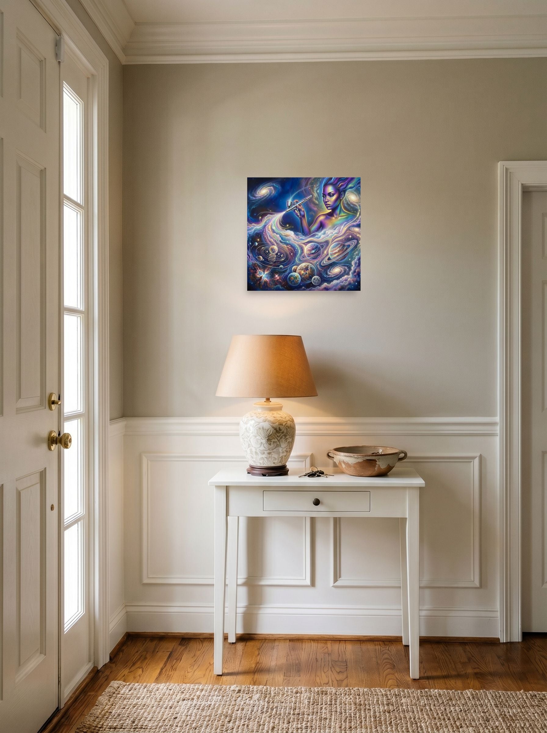A 14x14 inch unframed paper Space art print of 'The Cosmic Painter' hanging in an entryway near a console.