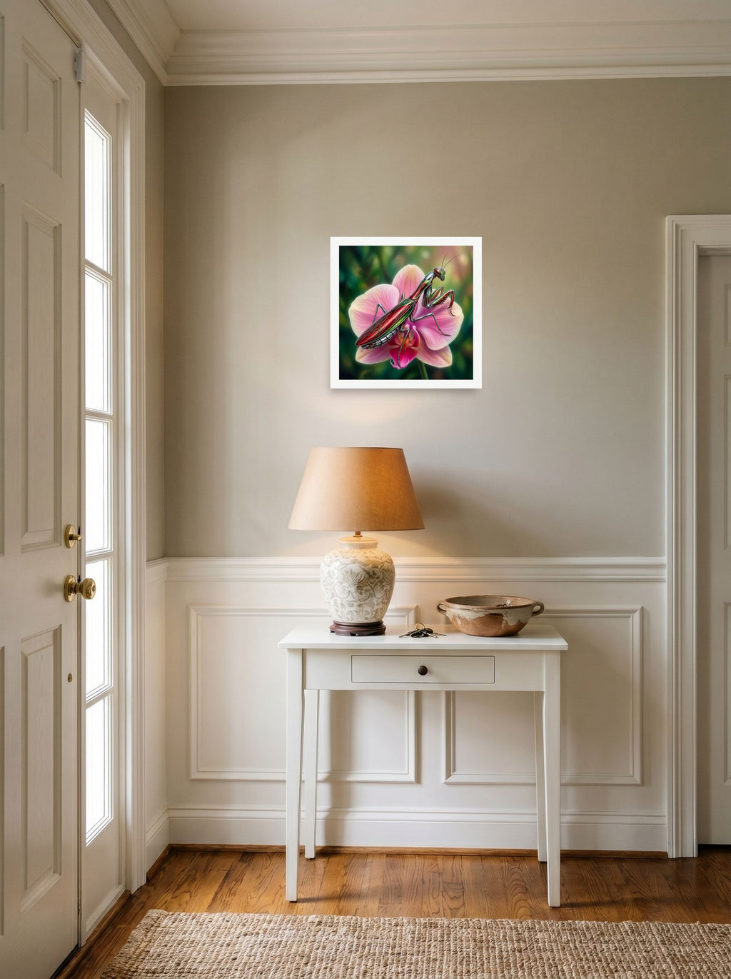 A 14x14 inch unframed paper Surrealism print of 'Chrome Mantis' hanging in an entryway near a console.