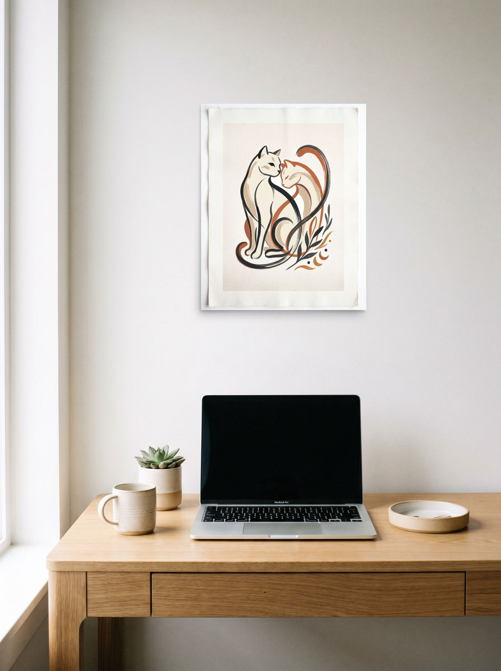 A 16x20 inch unframed paper Minimalism,Abstract art print of 'Feline Affection' hanging above a worktable with a laptop.