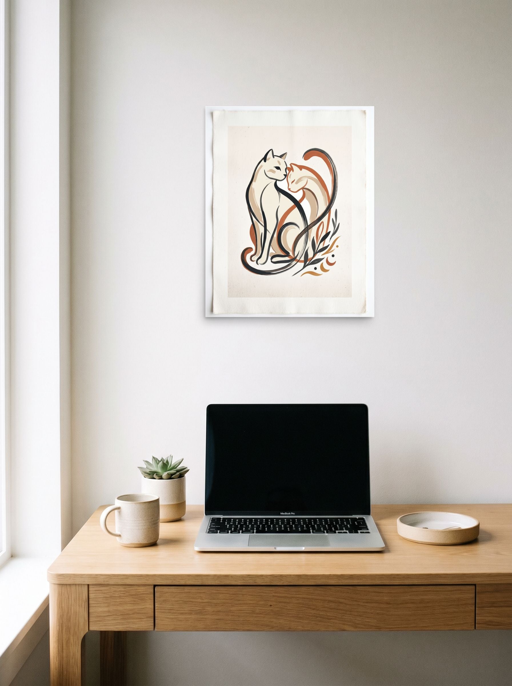 A 16x20 inch unframed paper Minimalism,Abstract art print of 'Feline Affection' hanging above a worktable with a laptop.