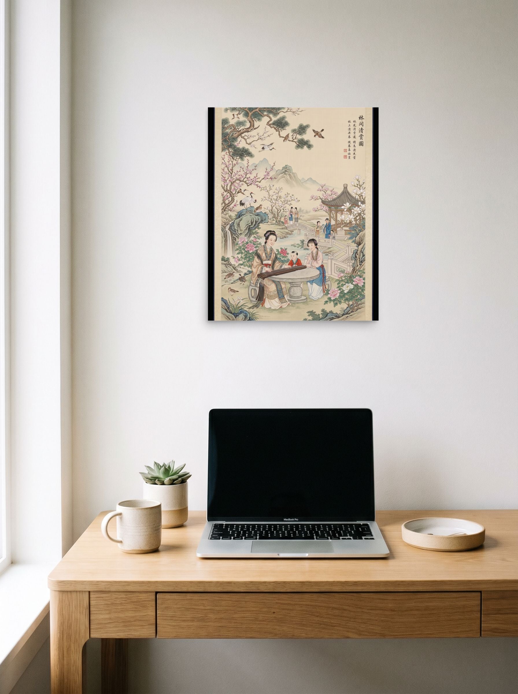 A 16x20 inch unframed paper Fine Art print of 'Melody in the Spring Garden' hanging above a worktable with a laptop.