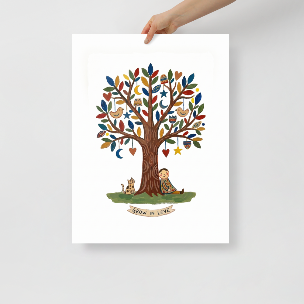 'The Tree Of Love' — a Naive art print. A heartwarming naive art piece showing a person and a spotted cat sitting under a tree decorated with hearts and moons, with a banner reading GROW IN LOVE.