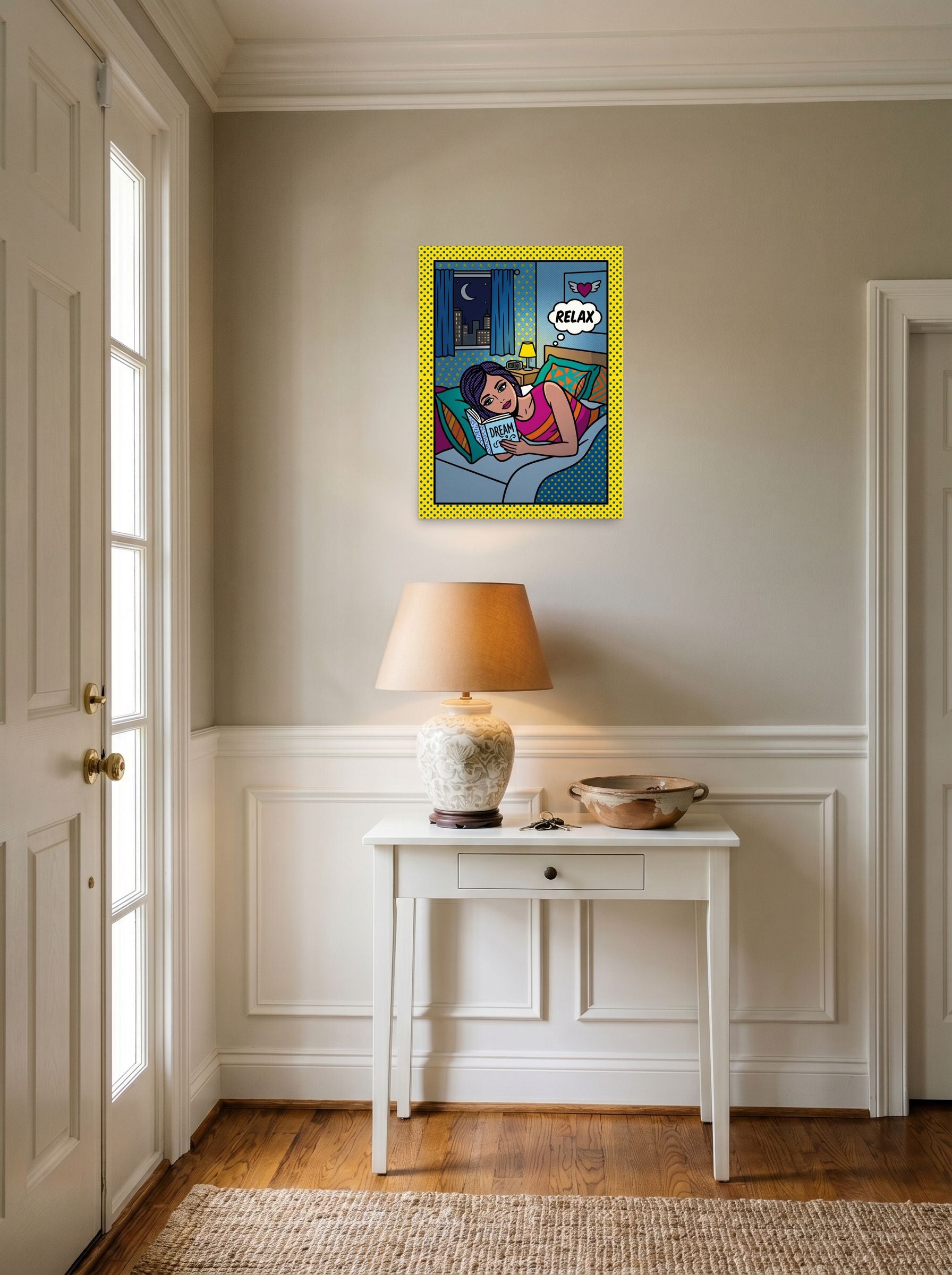 A 18x24 inch unframed paper Pop art print of 'Relax and Dream' hanging in an entryway near a console.
