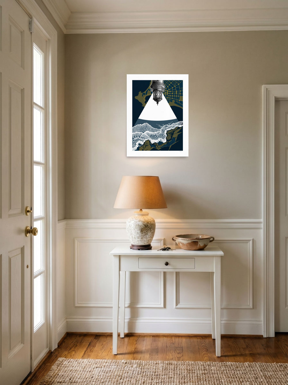 'Beacon Over the Breakers' in 18x24 inch unframed paper, set against a bright entryway wall.