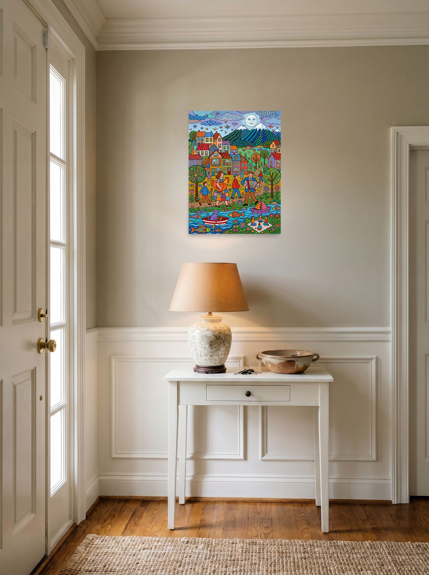 A 18x24 inch unframed paper Naive art print of 'Moonlit Melody By The River' hanging in an entryway near a console.