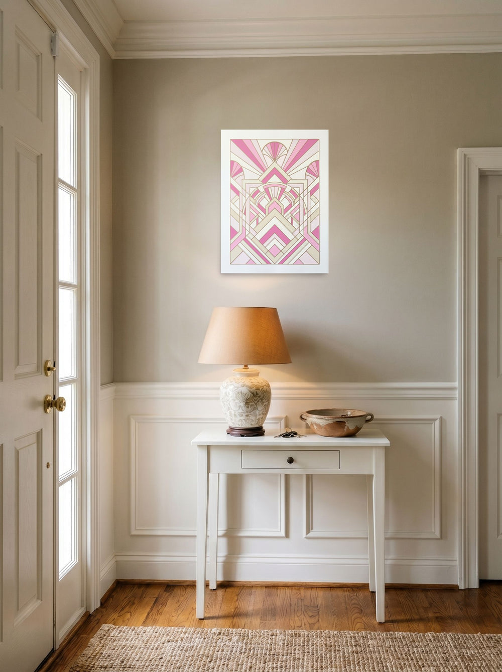 A 18x24 inch unframed paper Art Deco print of 'Rose Deco Radiance' hanging in an entryway near a console.