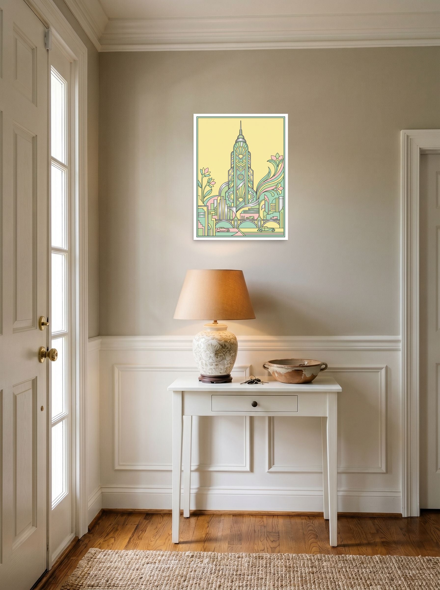 A 18x24 inch unframed paper Art Deco print of 'The Emerald Spire' hanging in an entryway near a console.