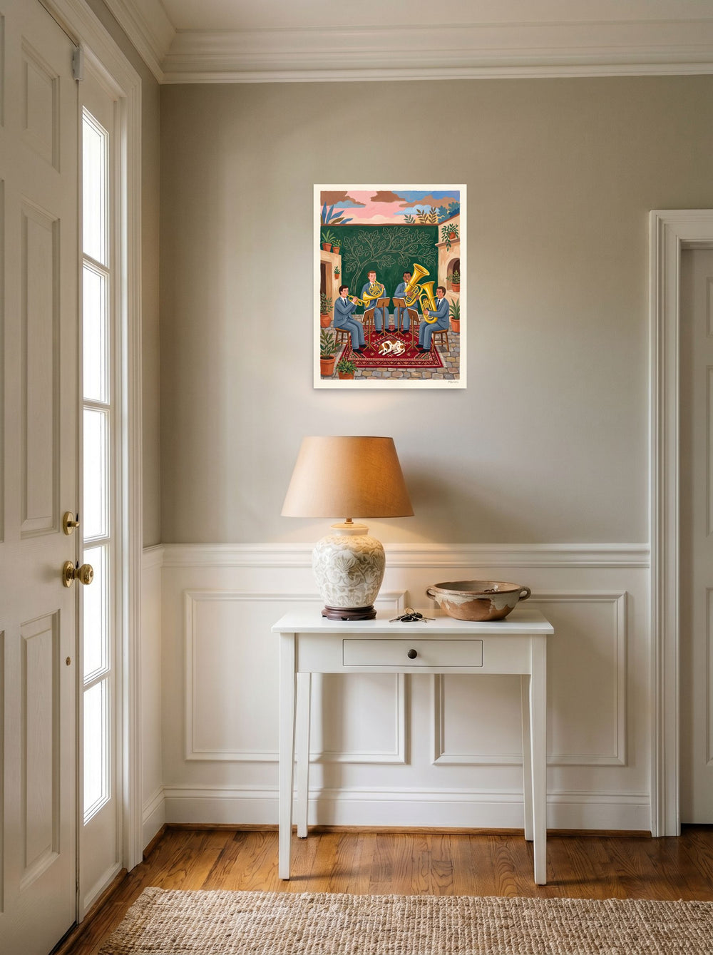 Mockup of 'Courtyard Serenade' as a 18x24 inch unframed paper print, styled above a console table in an entryway.