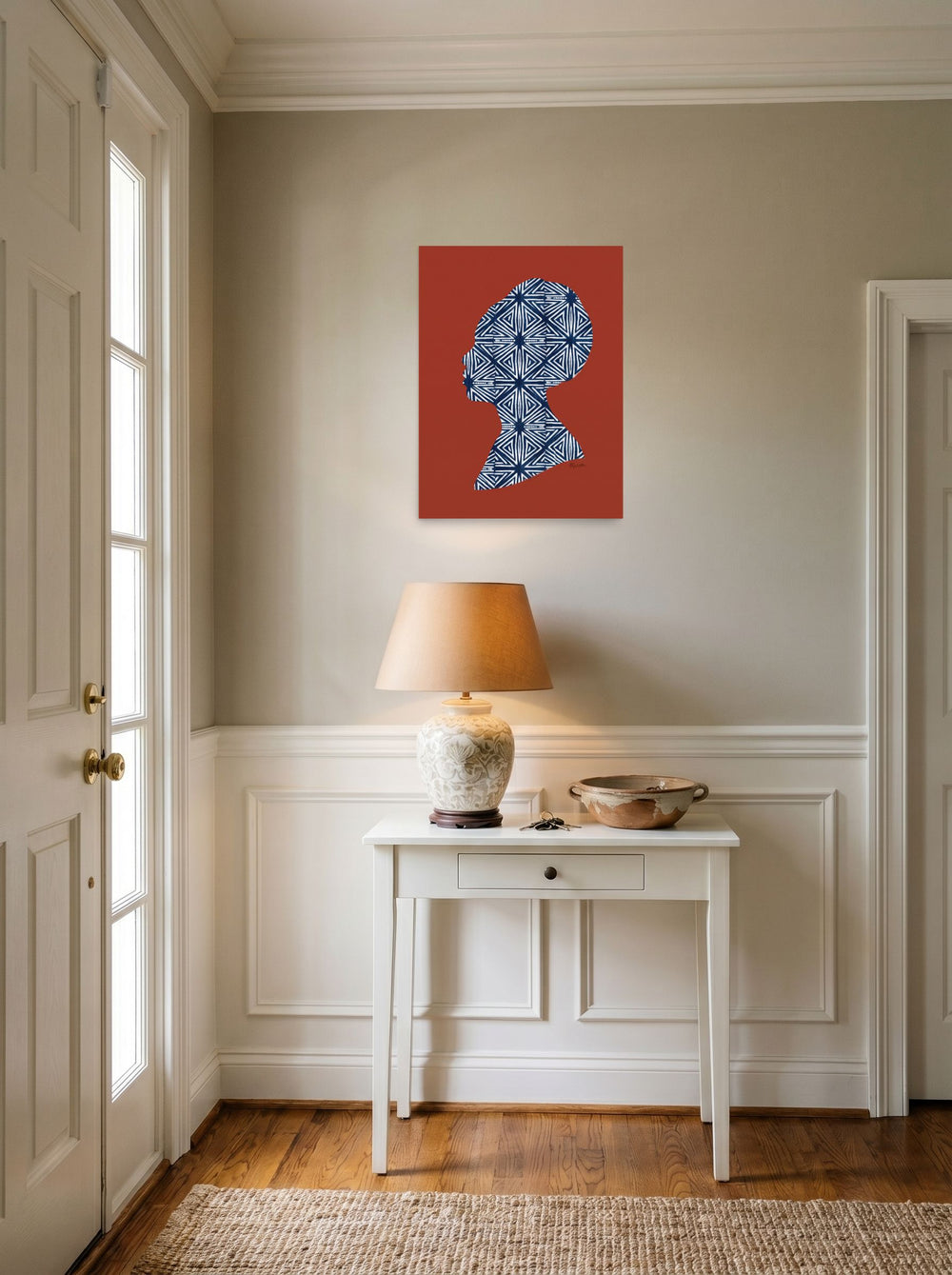 A 18x24 inch unframed paper Figurative art,Minimalism print of 'Indigo Heritage' hanging in an entryway near a console.