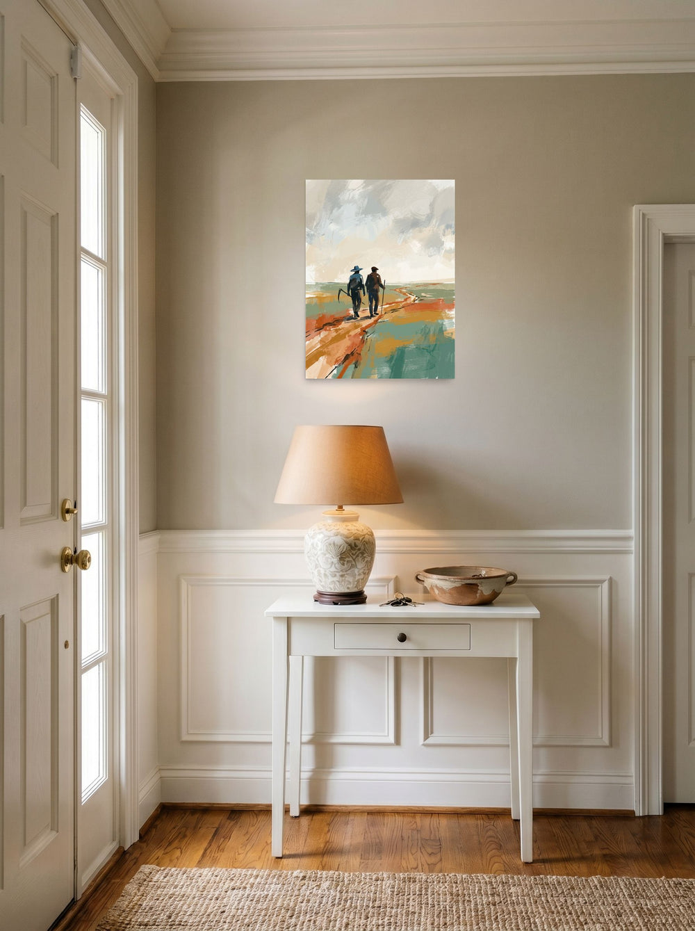 A 18x24 inch unframed paper Impressionism,Minimalism print of 'The Long Road Home' hanging in an entryway near a console.