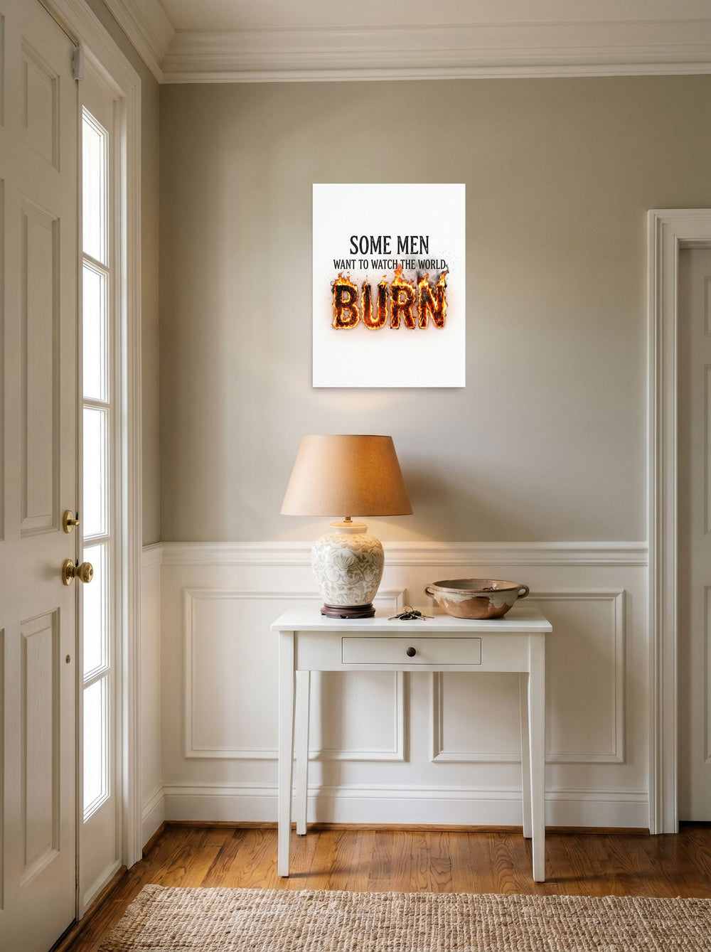A 18x24 inch unframed paper Digital art,Pop art print of 'Watch the World Burn' hanging in an entryway near a console.