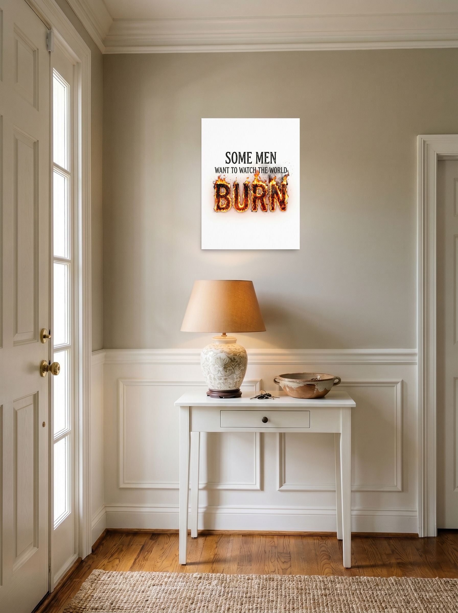 A 18x24 inch unframed paper Digital art,Pop art print of 'Watch the World Burn' hanging in an entryway near a console.