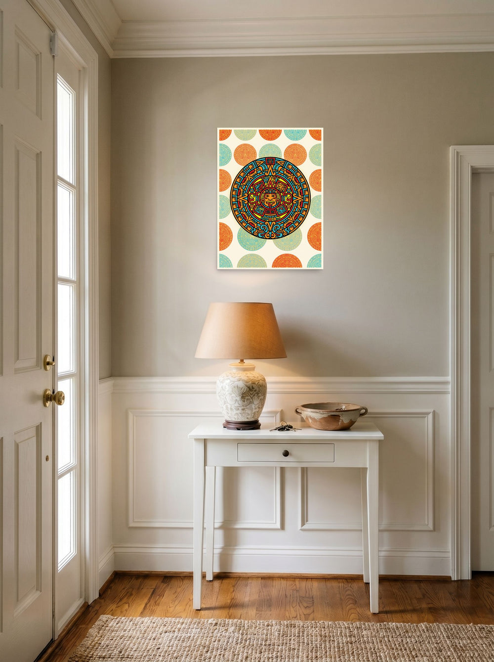 A 18x24 inch unframed paper Pop art print of 'Pop Aztec Sun' hanging in an entryway near a console.