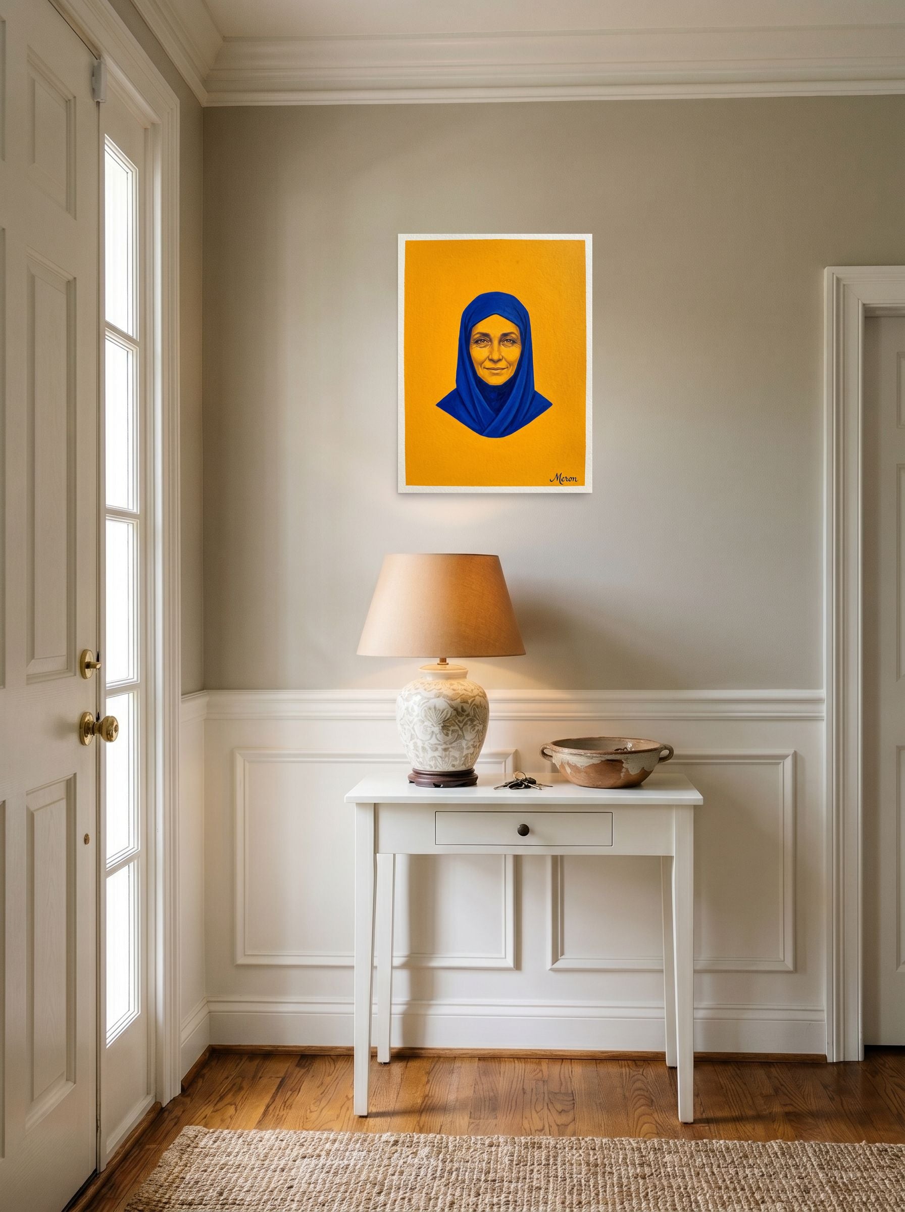 A 18x24 inch unframed paper Pop art print of 'Azure Serenity' hanging in an entryway near a console.