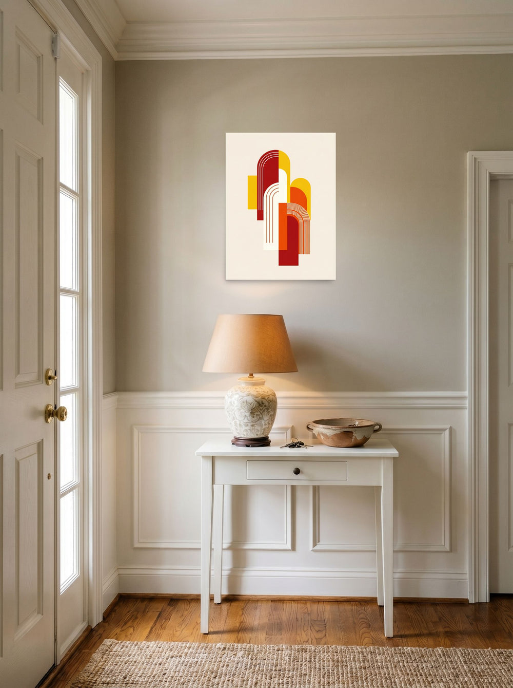 A 18x24 inch unframed paper Geometric abstract art print of 'Sunset Arches' hanging in an entryway near a console.