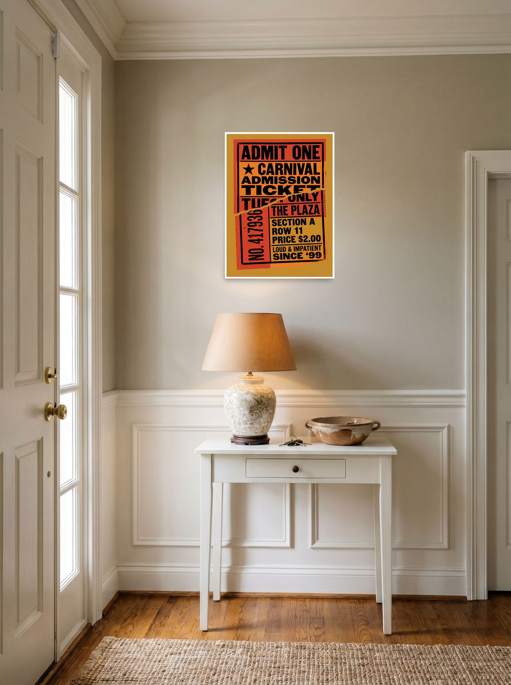 A 18x24 inch unframed paper Pop art print of 'Torn Admission' hanging in an entryway near a console.
