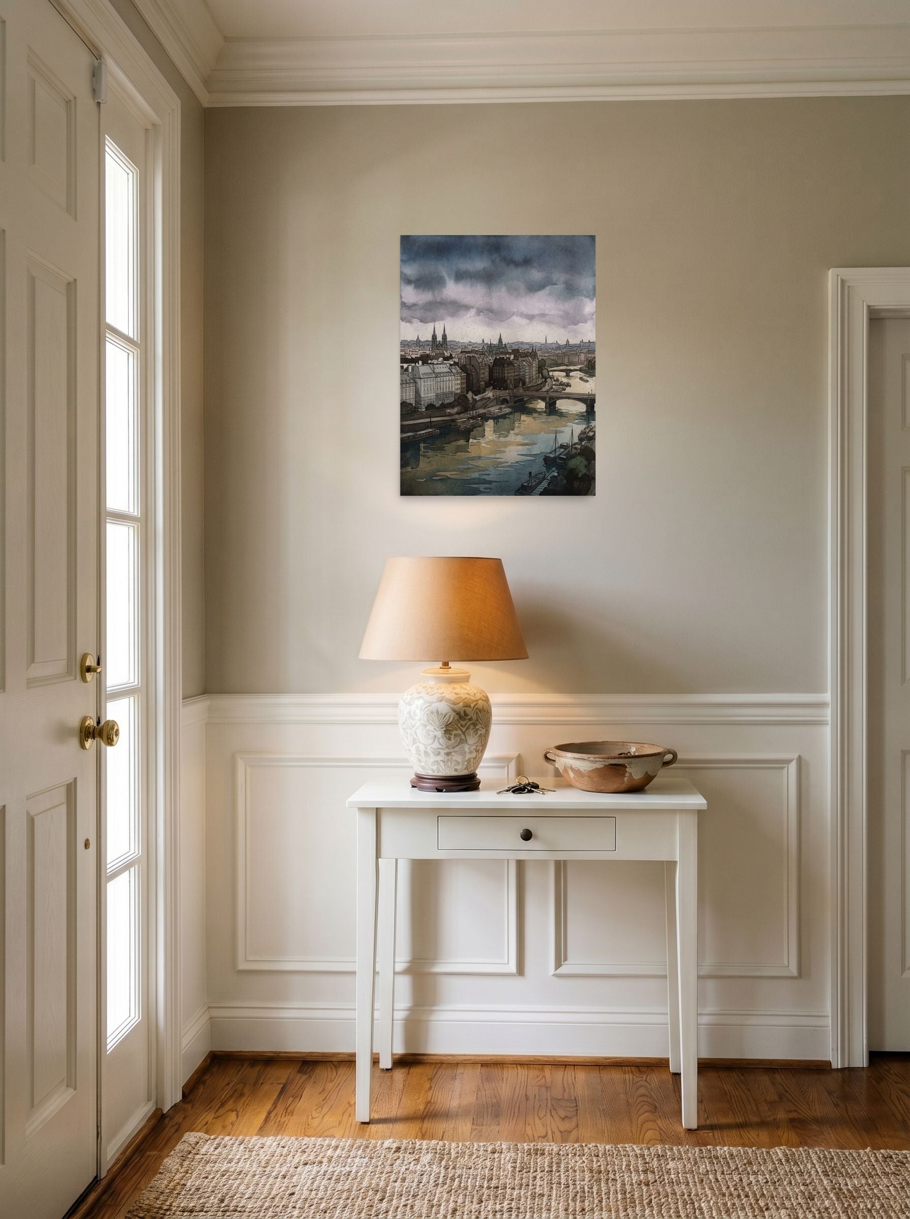 A 18x24 inch unframed paper Impressionism print of 'Twilight Over the Seine' hanging in an entryway near a console.