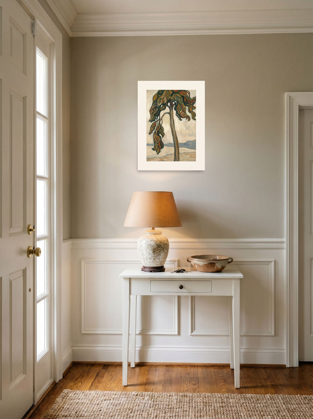 Mockup of 'Solitary Pine by the Shore' as a 18x24 inch unframed paper print, styled above a console table in an entryway.