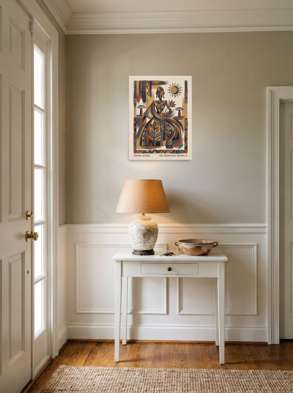 A 18x24 inch unframed paper Dakar School,Modernism print of 'Spirit of Négritude' hanging in an entryway near a console.