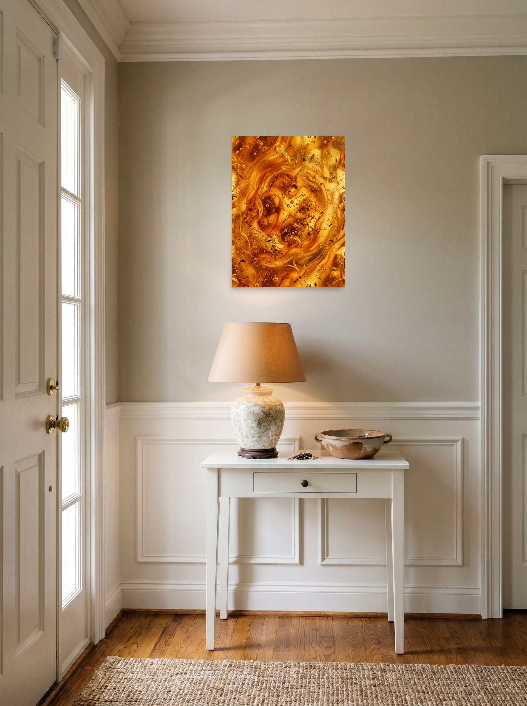 A 18x24 inch unframed paper Abstract art print of 'Amber Depths' hanging in an entryway near a console.