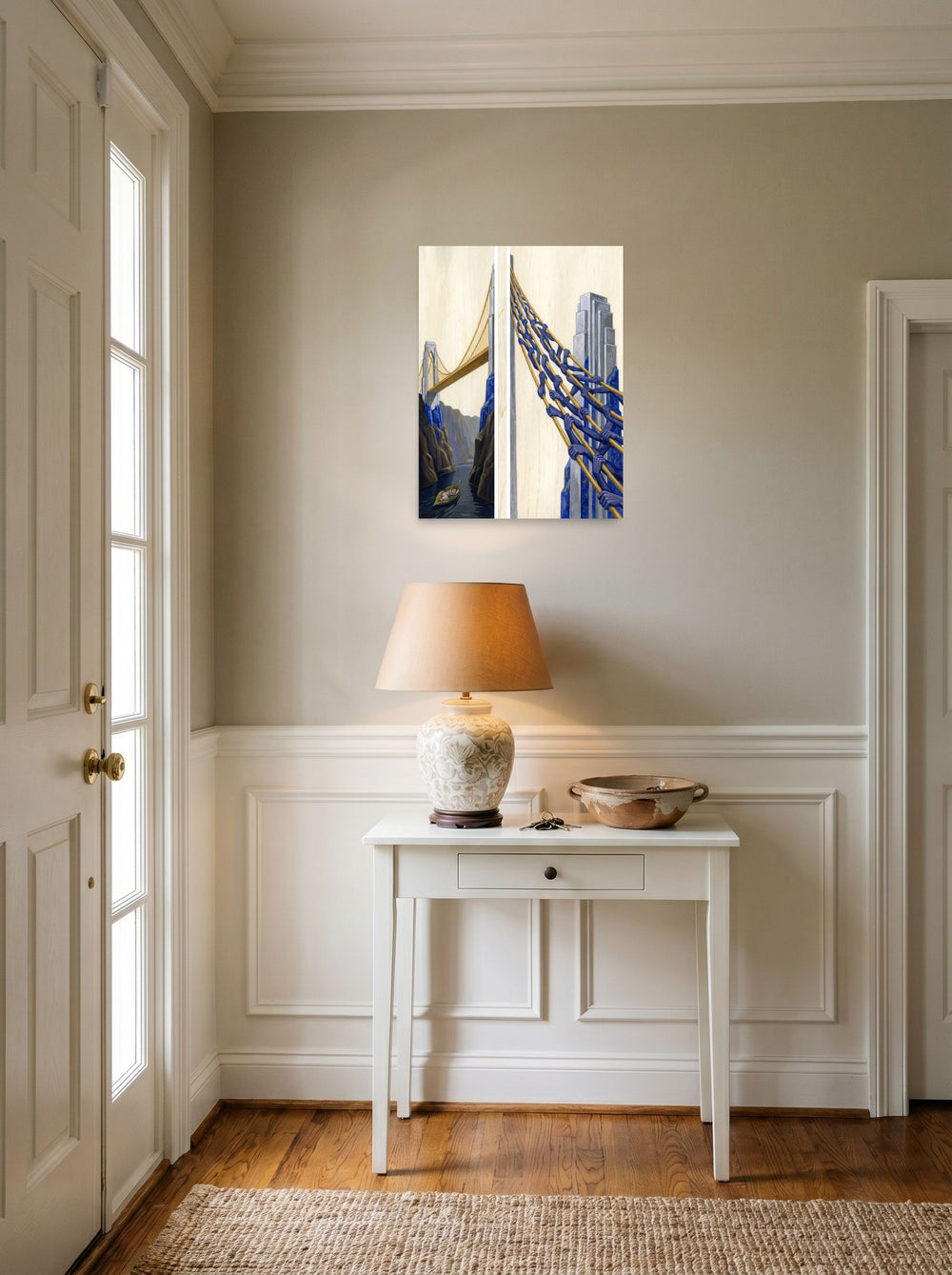 A 18x24 inch unframed paper Art Deco,Surrealism print of 'The Pillars of Dreams' hanging in an entryway near a console.