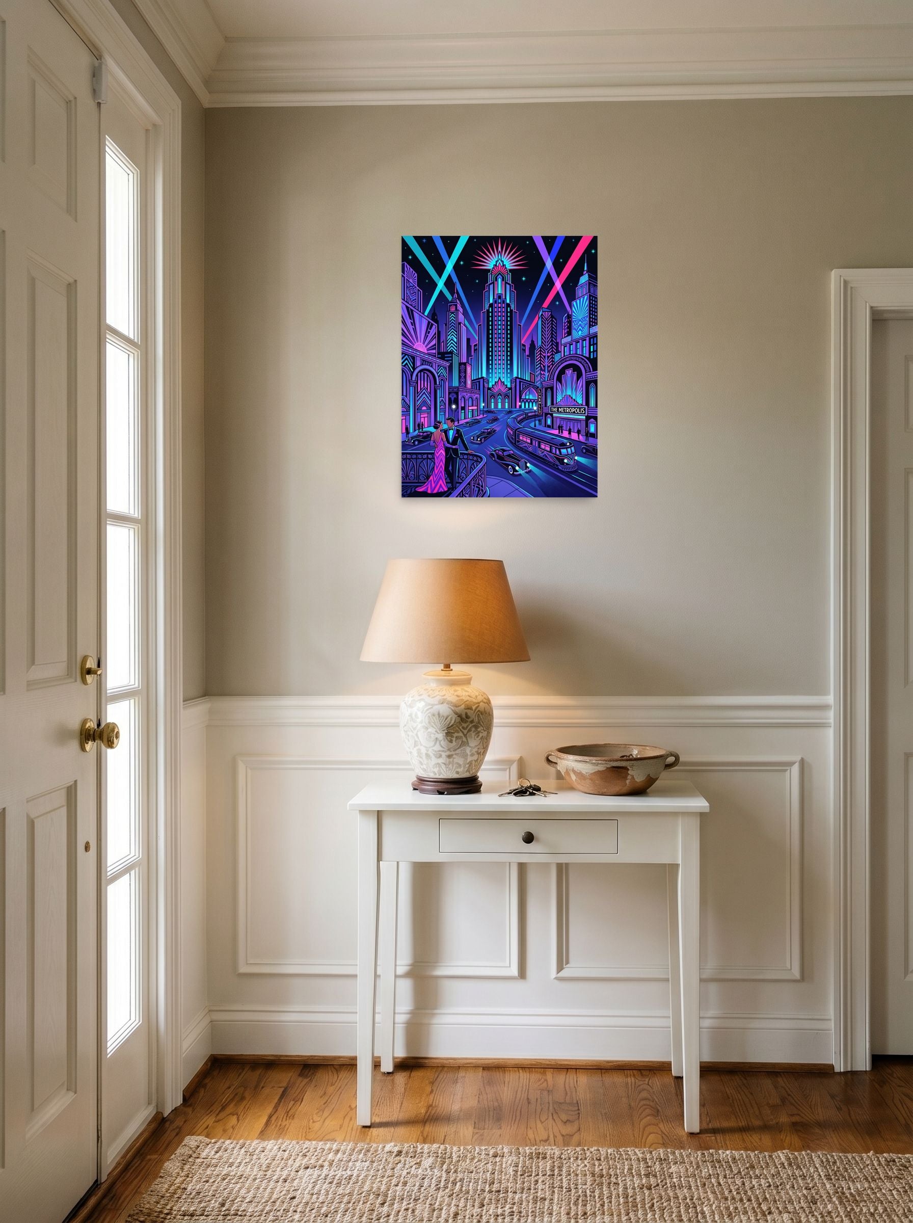 A 18x24 inch unframed paper Art Deco print of 'Neon Nights at The Metropolis' hanging in an entryway near a console.
