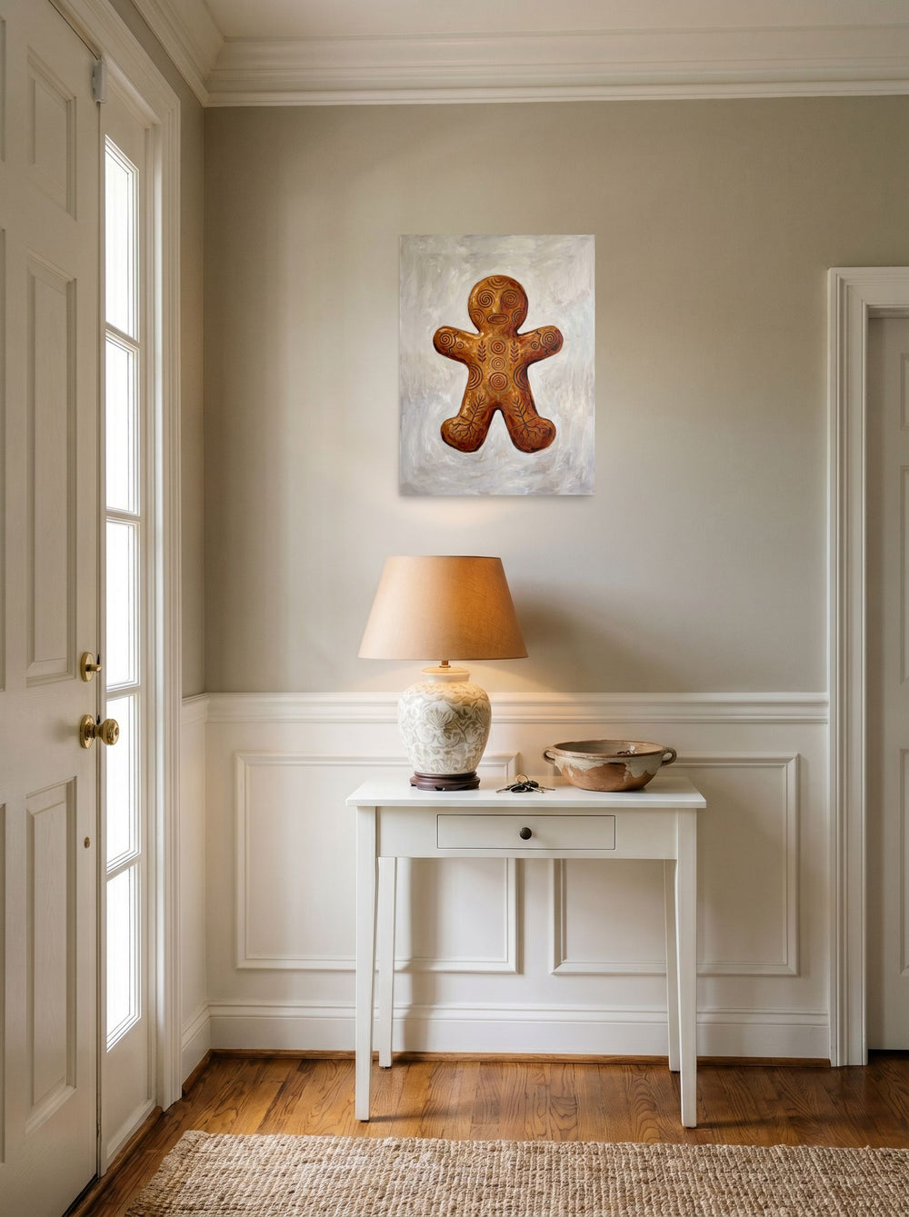 'Ancient Gingerbread Totem' hanging in an entryway near a console. A 18x24 inch unframed paper Folk art print.