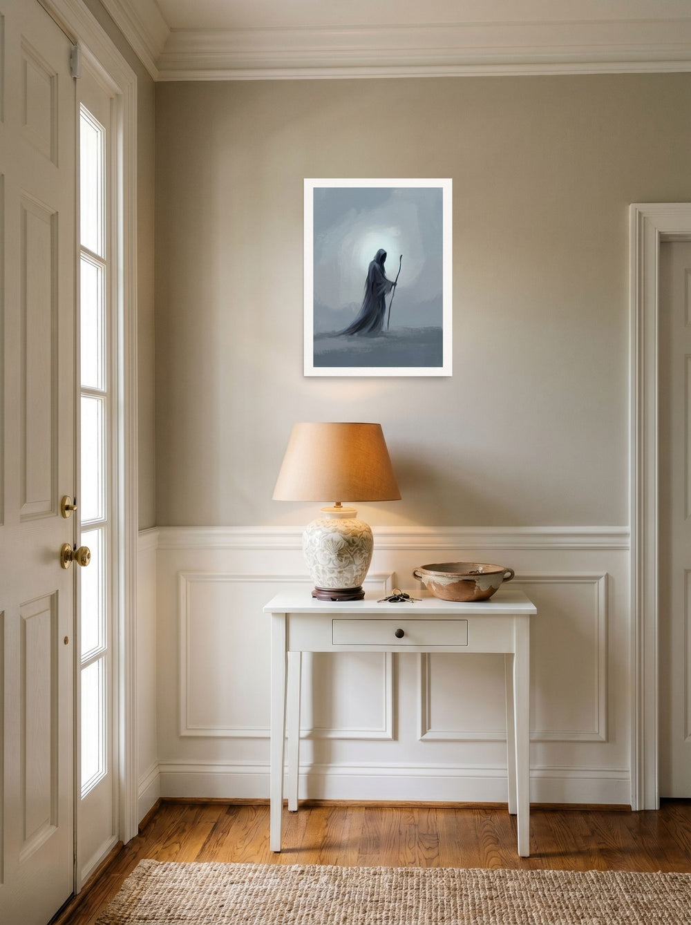 'The Solitary Wanderer' as a unframed paper print, 18x24 inch, hanging in an entryway near a console.