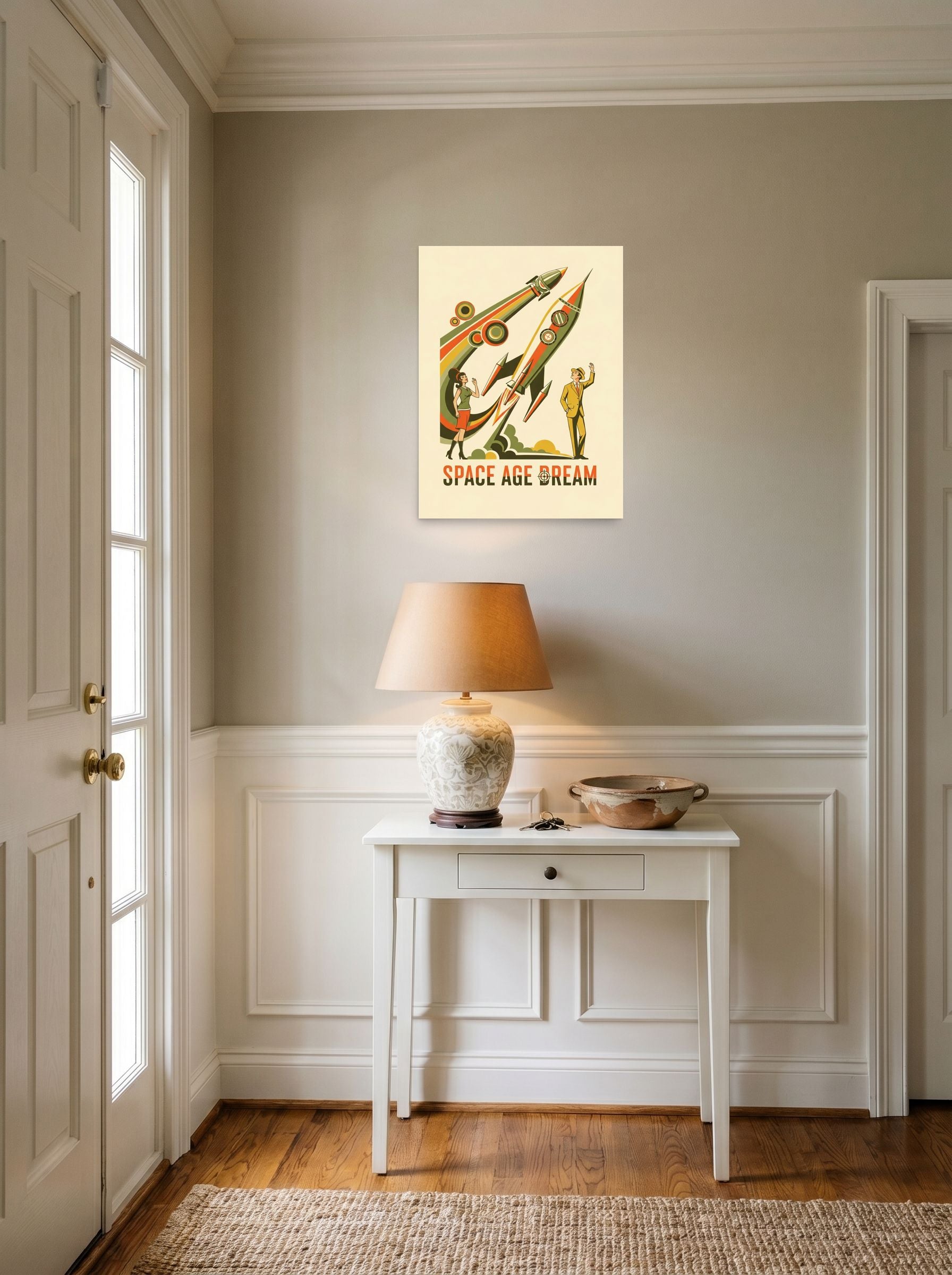 A 18x24 inch unframed paper Retrofuturism,Pop art print of 'Space Age Dream' hanging in an entryway near a console.