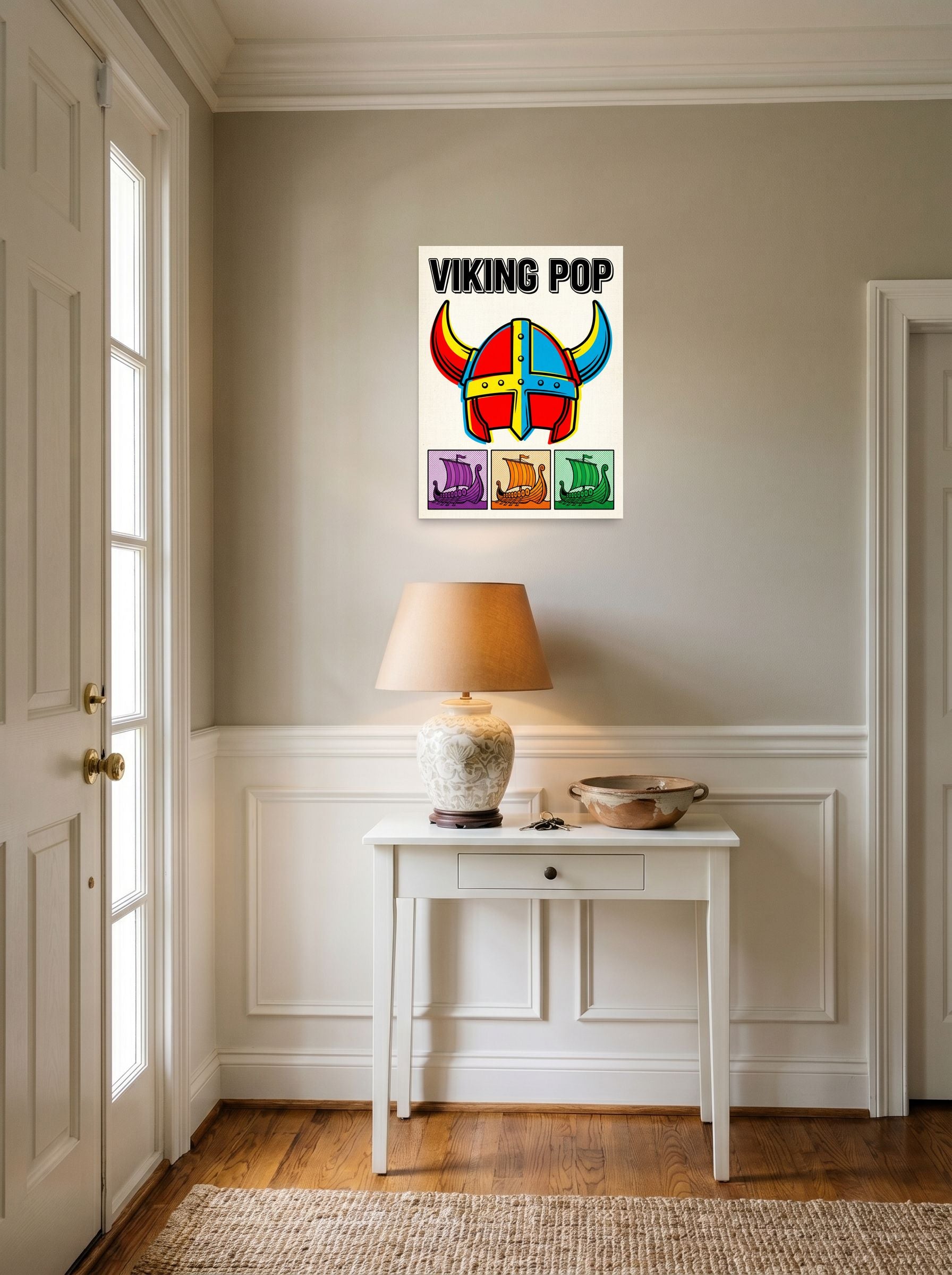 A 18x24 inch unframed paper Pop art print of 'Viking Pop' hanging in an entryway near a console.