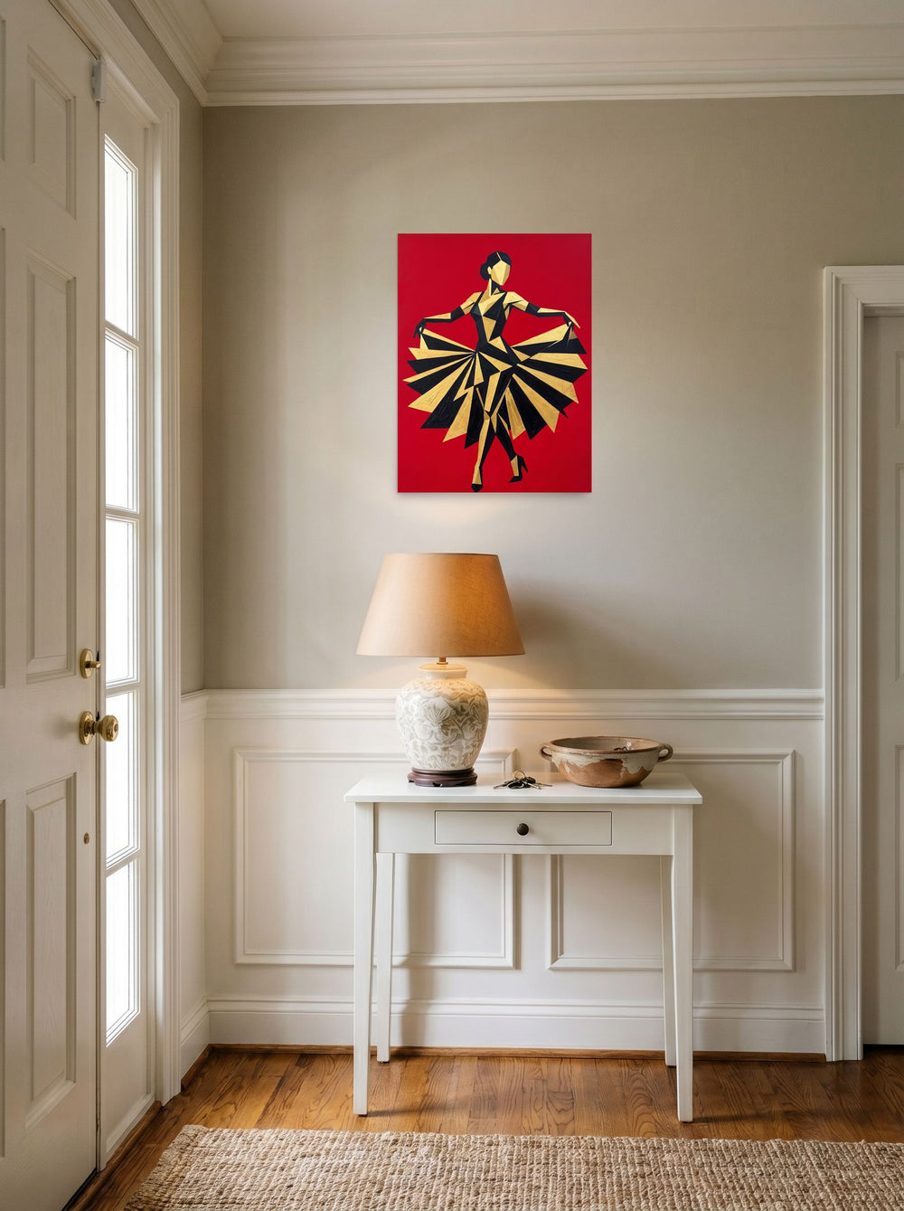 A 18x24 inch unframed paper Art Deco,Cubism print of 'The Golden Dancer' hanging in an entryway near a console.