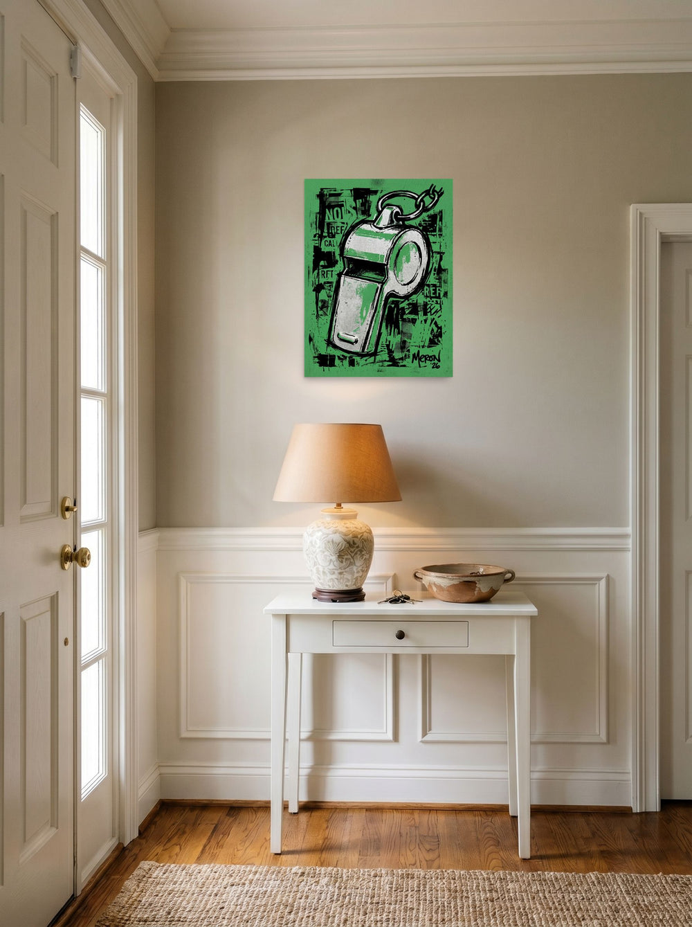 A 18x24 inch unframed paper Pop art print of 'The Referee's Call' hanging in an entryway near a console.