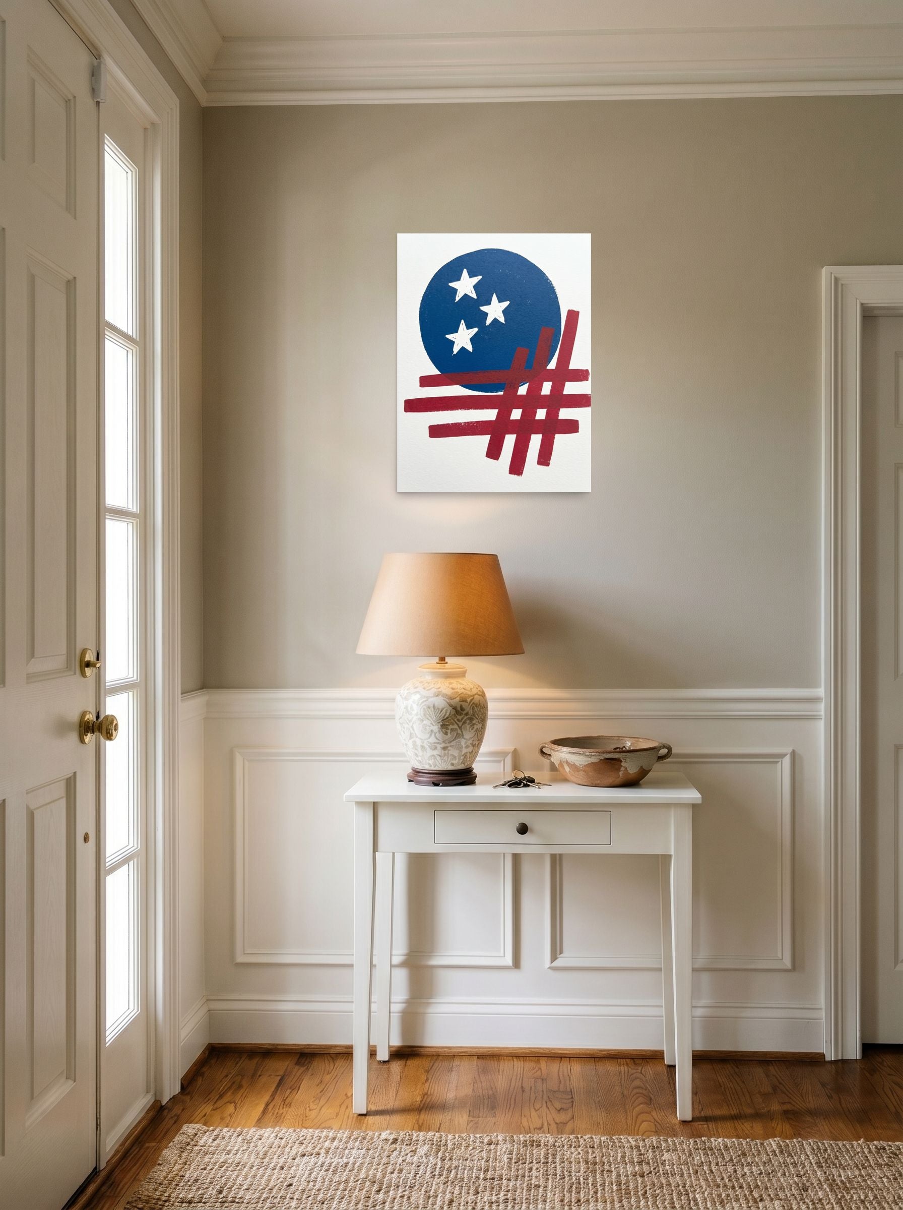 A 18x24 inch unframed paper Abstract art print of 'Patriotic Abstraction' hanging in an entryway near a console.