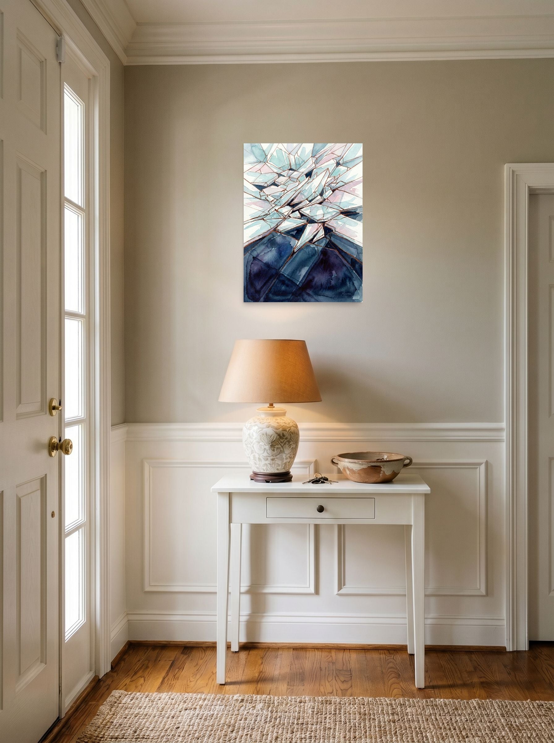 A 18x24 inch unframed paper Expressionism print of 'Coastal Thunderstorm' hanging in an entryway near a console.