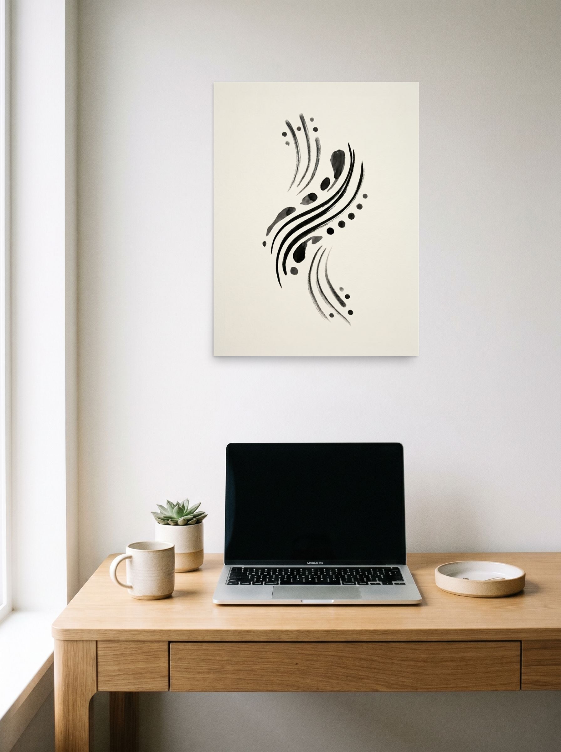 A 18x24 inch unframed paper Minimalism,Abstract art print of 'Fluid Cadence' hanging above a worktable with a laptop.