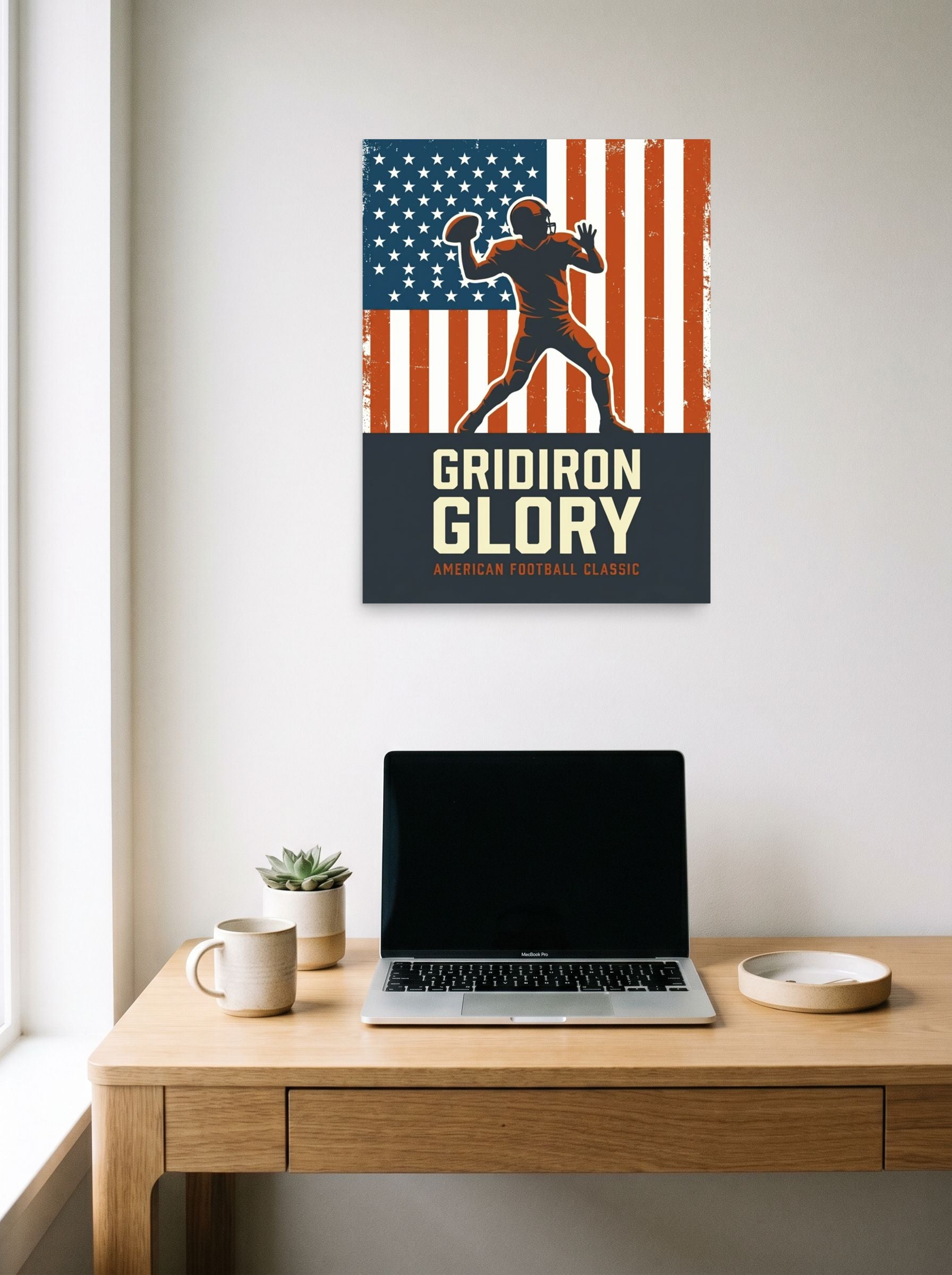 A 18x24 inch unframed paper Pop art,Digital art print of 'Gridiron Glory' hanging above a worktable with a laptop.