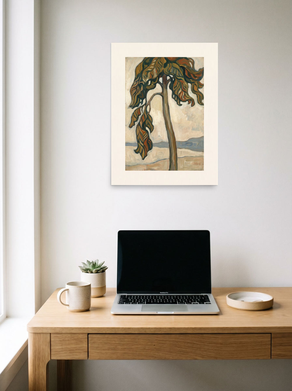 The Les Nabis print 'Solitary Pine by the Shore', 18x24 inch unframed paper, displayed over a compact desk setup.