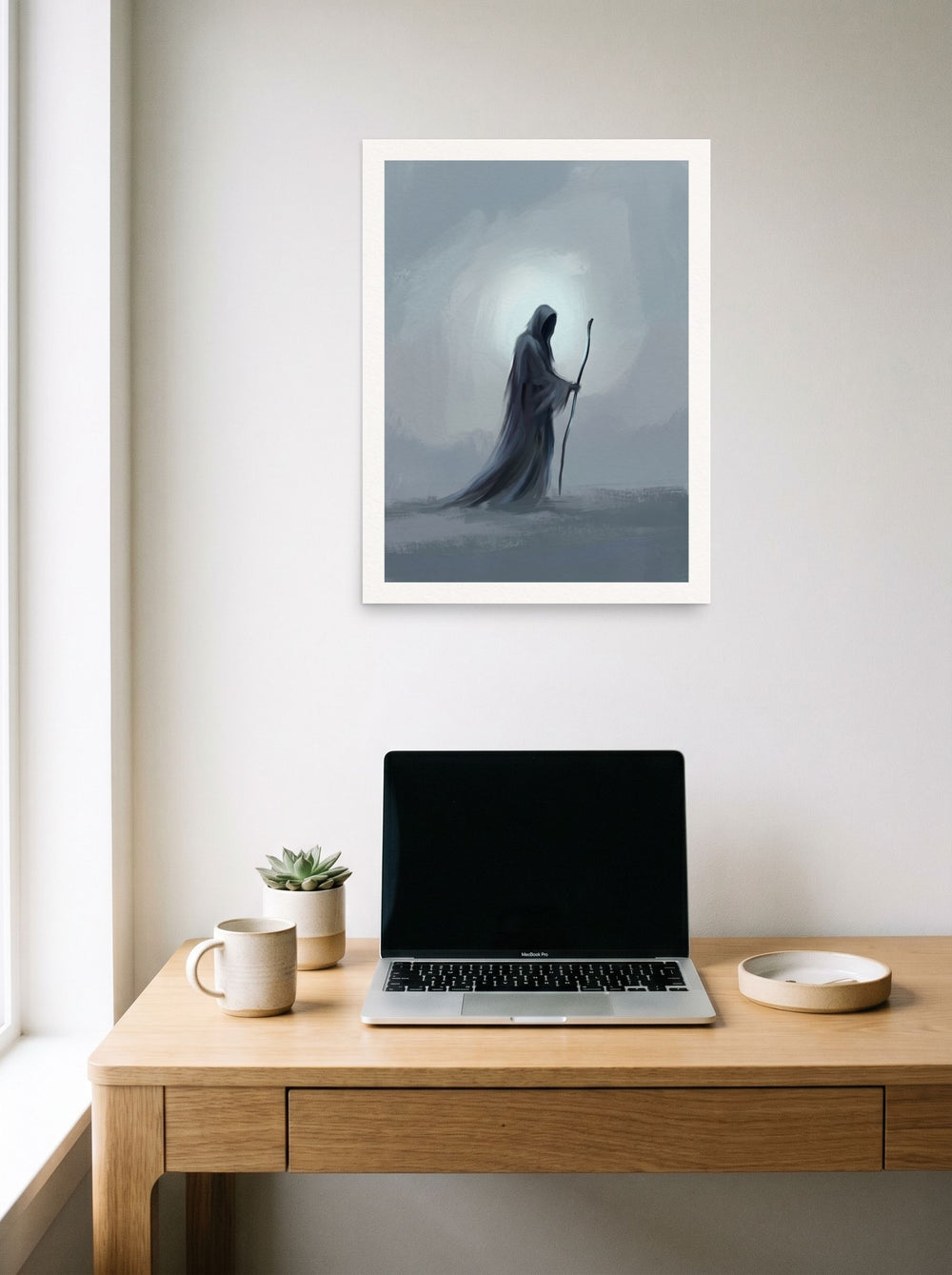 'The Solitary Wanderer', a Symbolism print styled above a home-office workspace. Shown as unframed paper, 18x24 inch.
