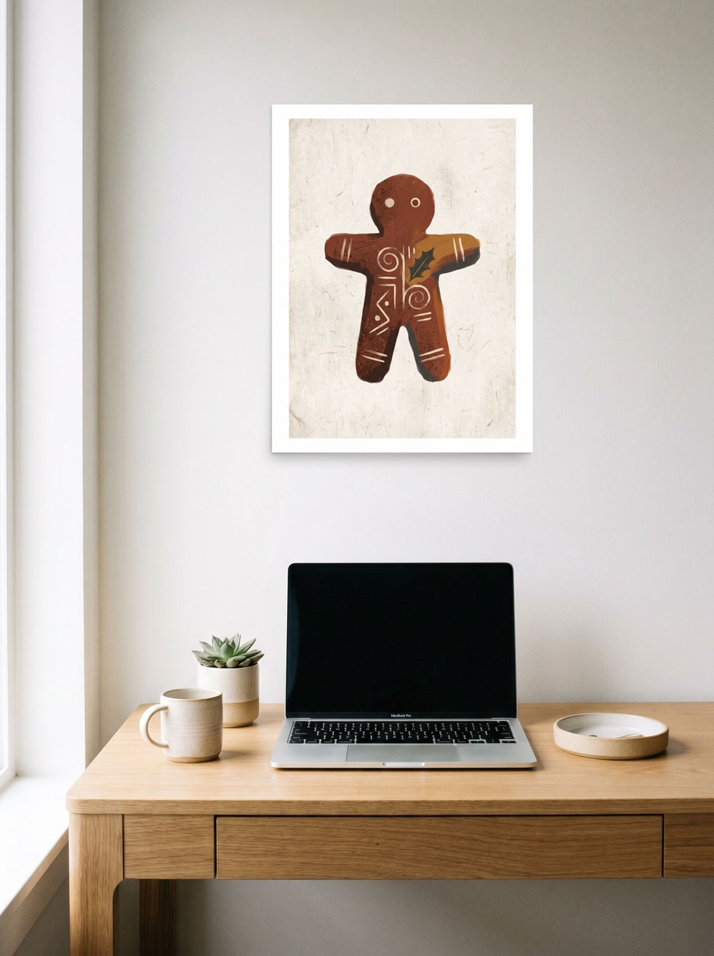 The unframed paper print 'Gingerbread Rune' displayed over a compact desk setup, shown at 18x24 inch.