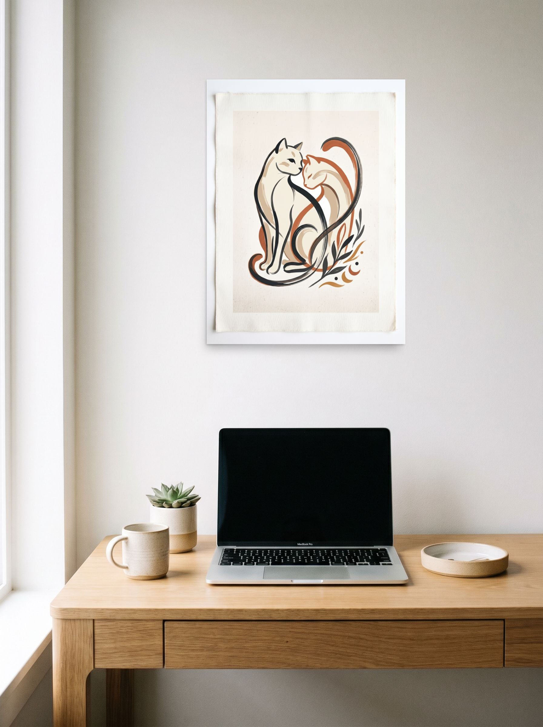 A 18x24 inch unframed paper Minimalism,Abstract art print of 'Feline Affection' hanging above a worktable with a laptop.