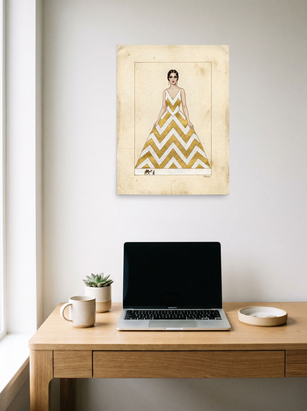 A 18x24 inch unframed paper Art Deco,Surrealism print of 'The Golden Chevron' hanging above a worktable with a laptop.