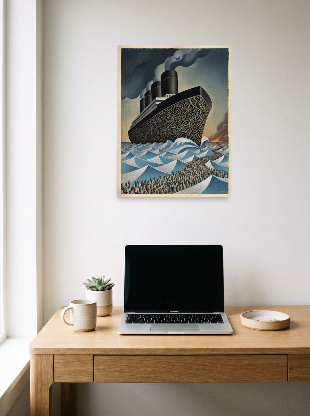 A 18x24 inch unframed paper Surrealism,Art Deco print of 'The Rooted Voyage' hanging above a worktable with a laptop.