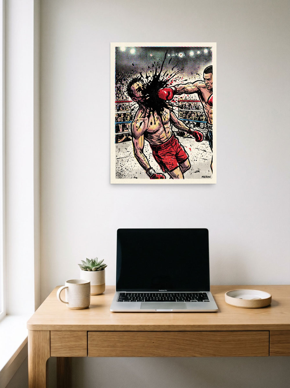 unframed paper wall art 'Halftone Knockout: Lionheart' hanging above a worktable with a laptop, at 18x24 inch.
