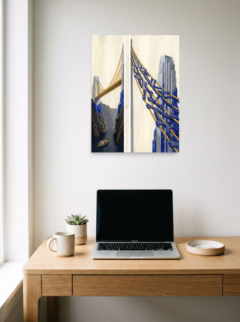 A 18x24 inch unframed paper Art Deco,Surrealism print of 'The Pillars of Dreams' hanging above a worktable with a laptop.