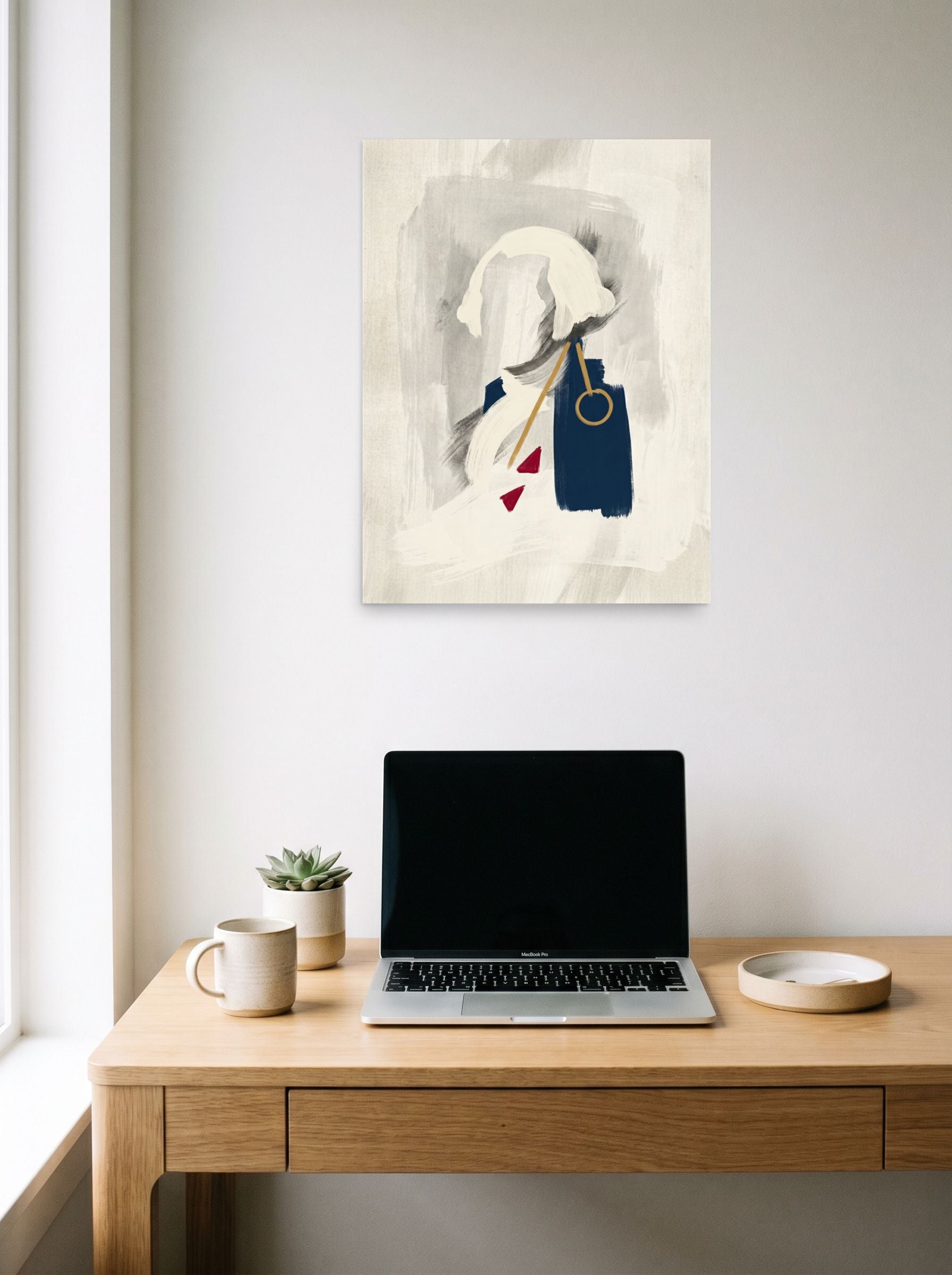 A 18x24 inch unframed paper Abstract art,Minimalism print of 'Abstract Statesman' hanging above a worktable with a laptop.
