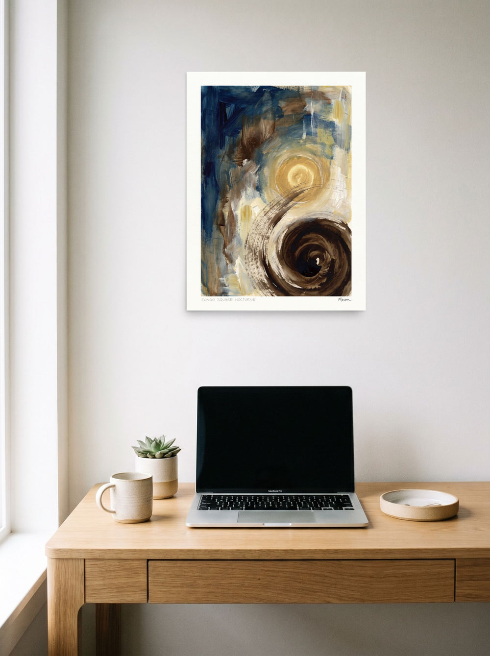 A unframed paper print of the Abstract expressionism artwork 'Congo Square Nocturne', styled above a home-office workspace.