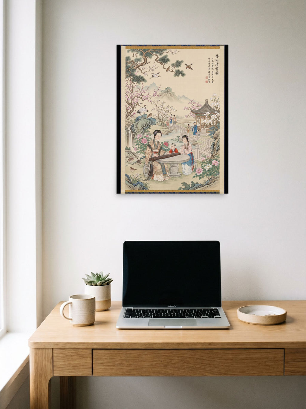 A 18x24 inch unframed paper Fine Art print of 'Melody in the Spring Garden' hanging above a worktable with a laptop.